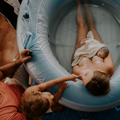 Woman relaxes after her tacoma water home birth